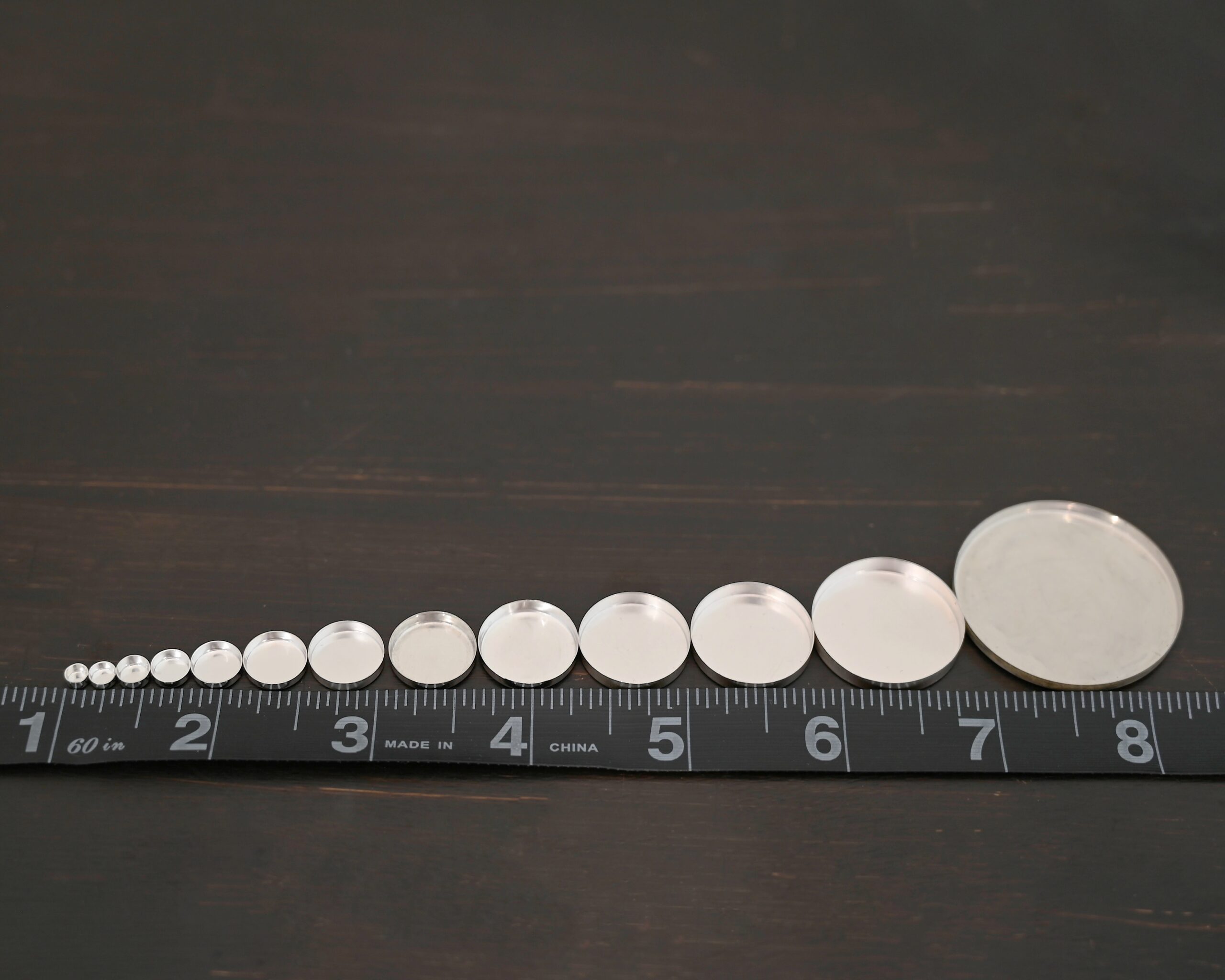Round Bezel Cups - shiny shown by ruler