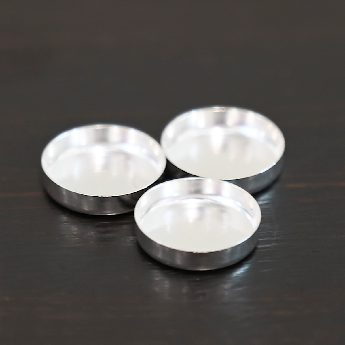 Round Bezel Cups - shiny shown on dark background
