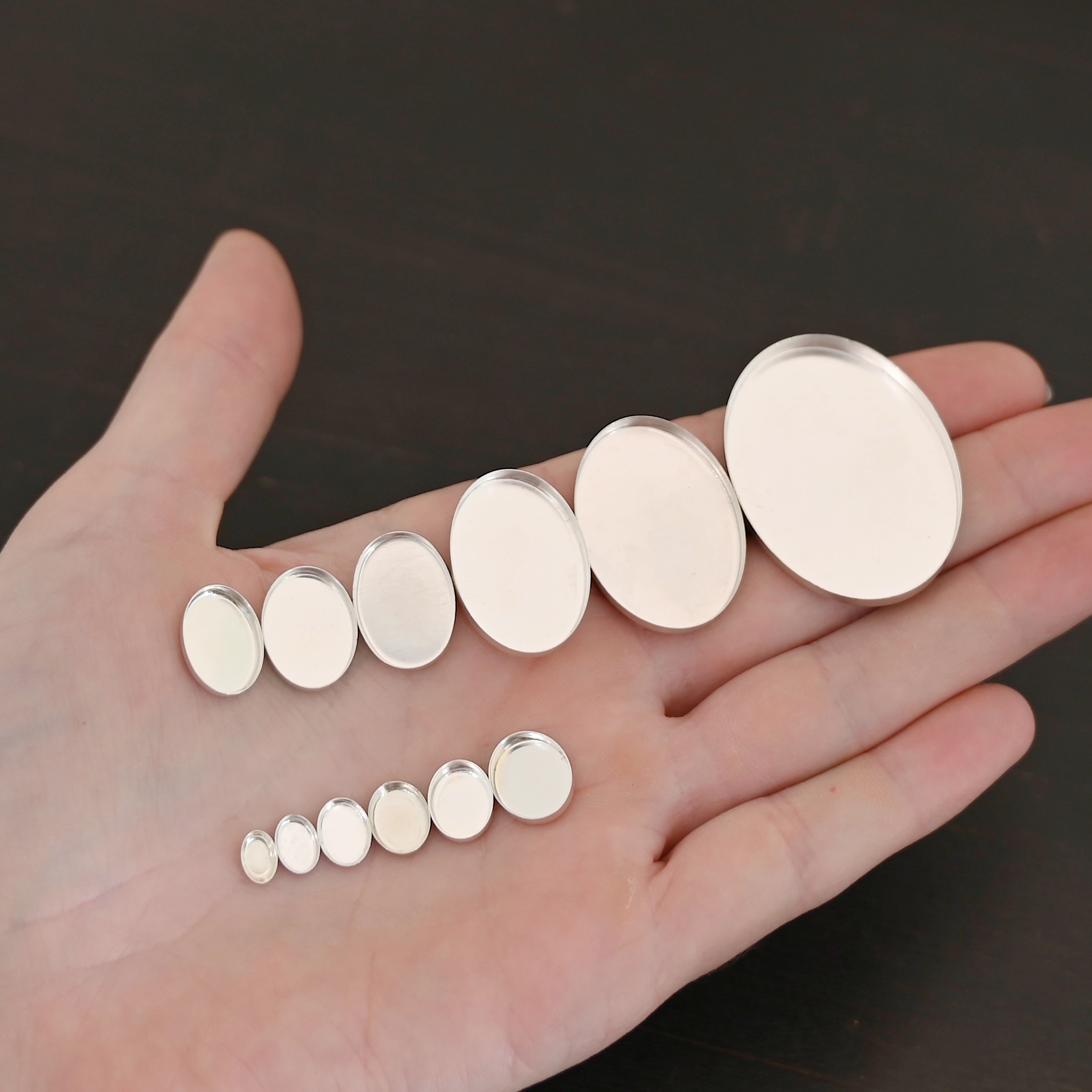 Oval Bezel Cups - shiny shown in hand