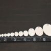 Oval Bezel Cups - shiny shown by ruler