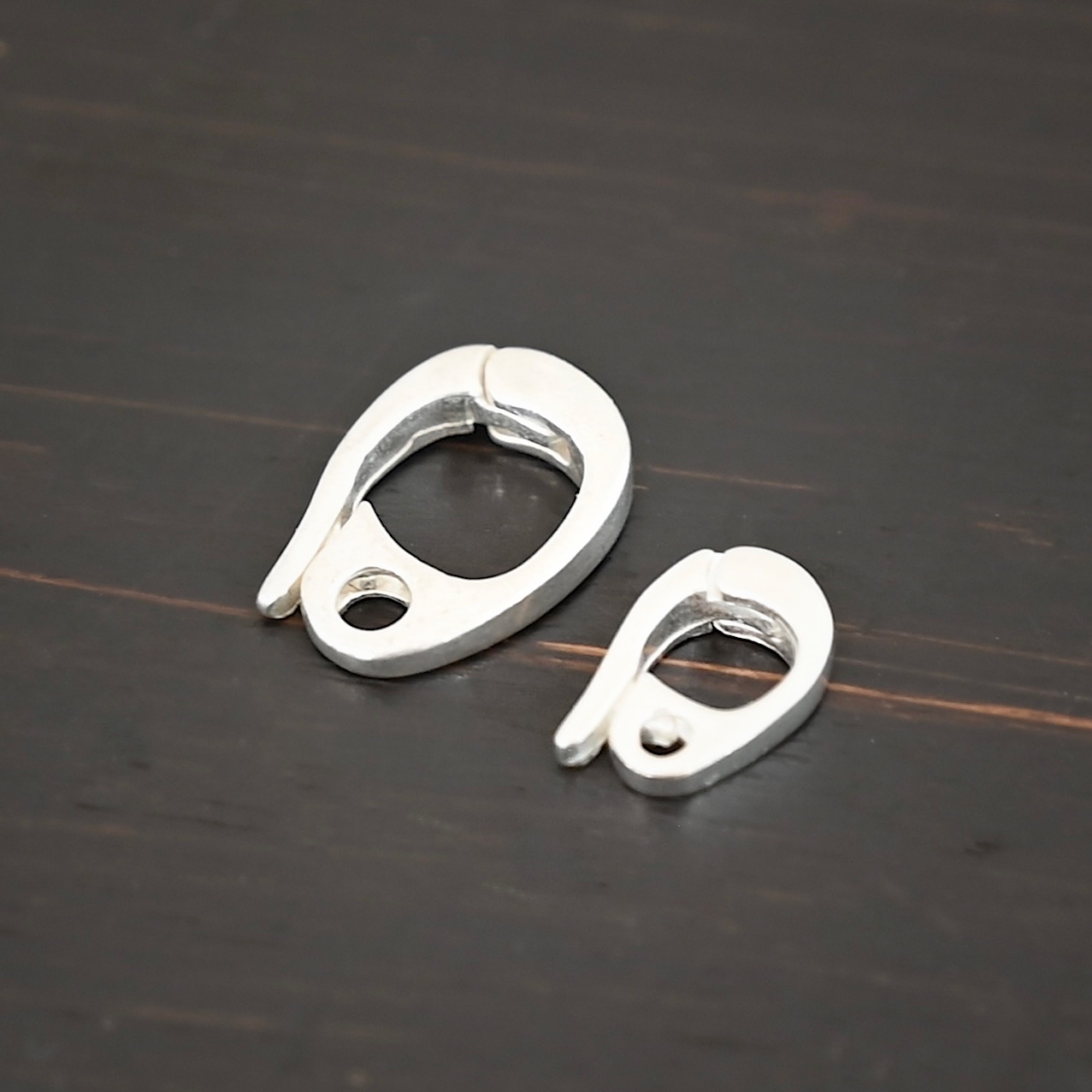 Silver Heavy Hinged Bail - shiny Silver Heavy Hinged Bail - shiny shown on dark background