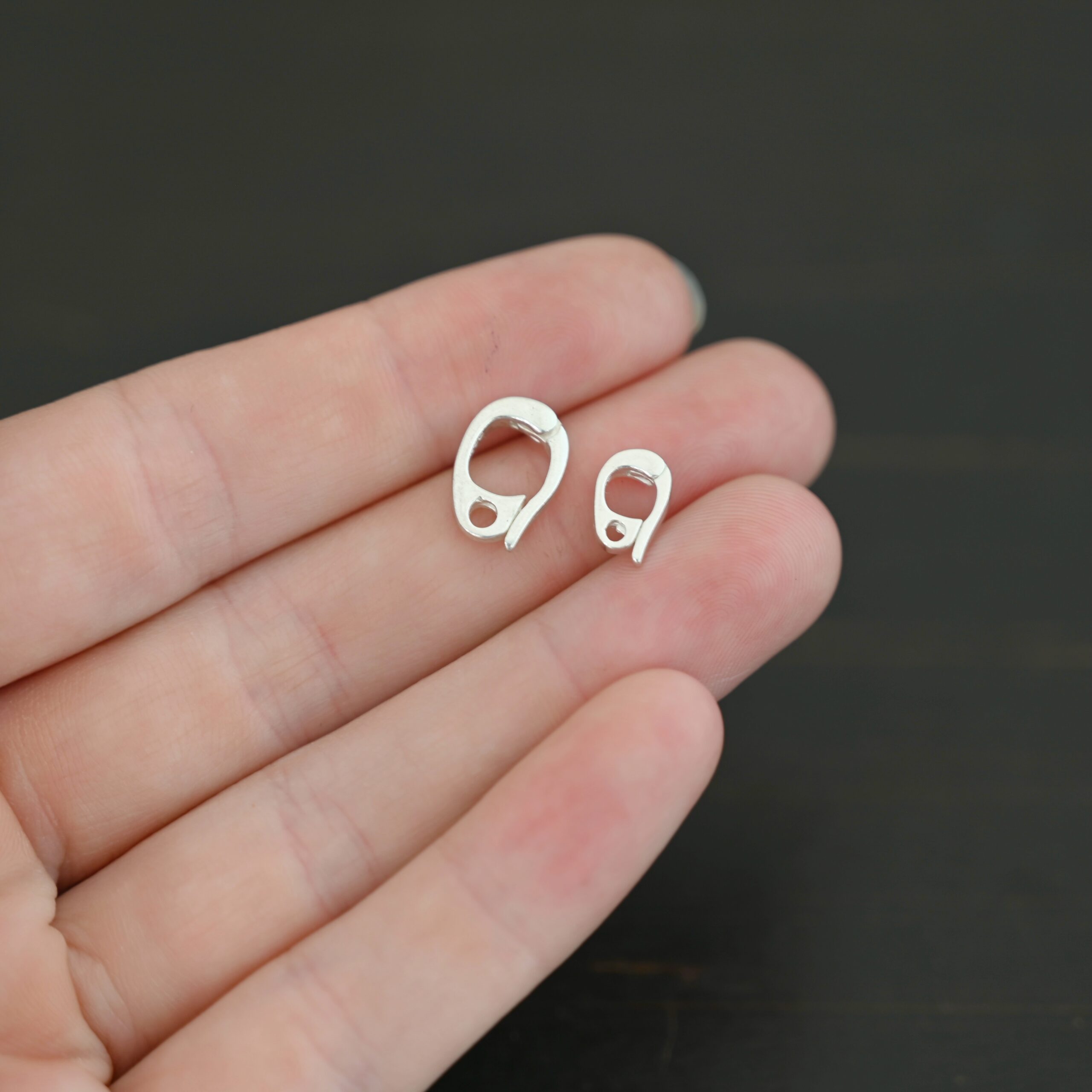 Silver Heavy Hinged Bail - shiny Silver Heavy Hinged Bail - shiny shown in hand