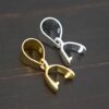Silver & Gold Plated Pinch Bail - shown on dark background