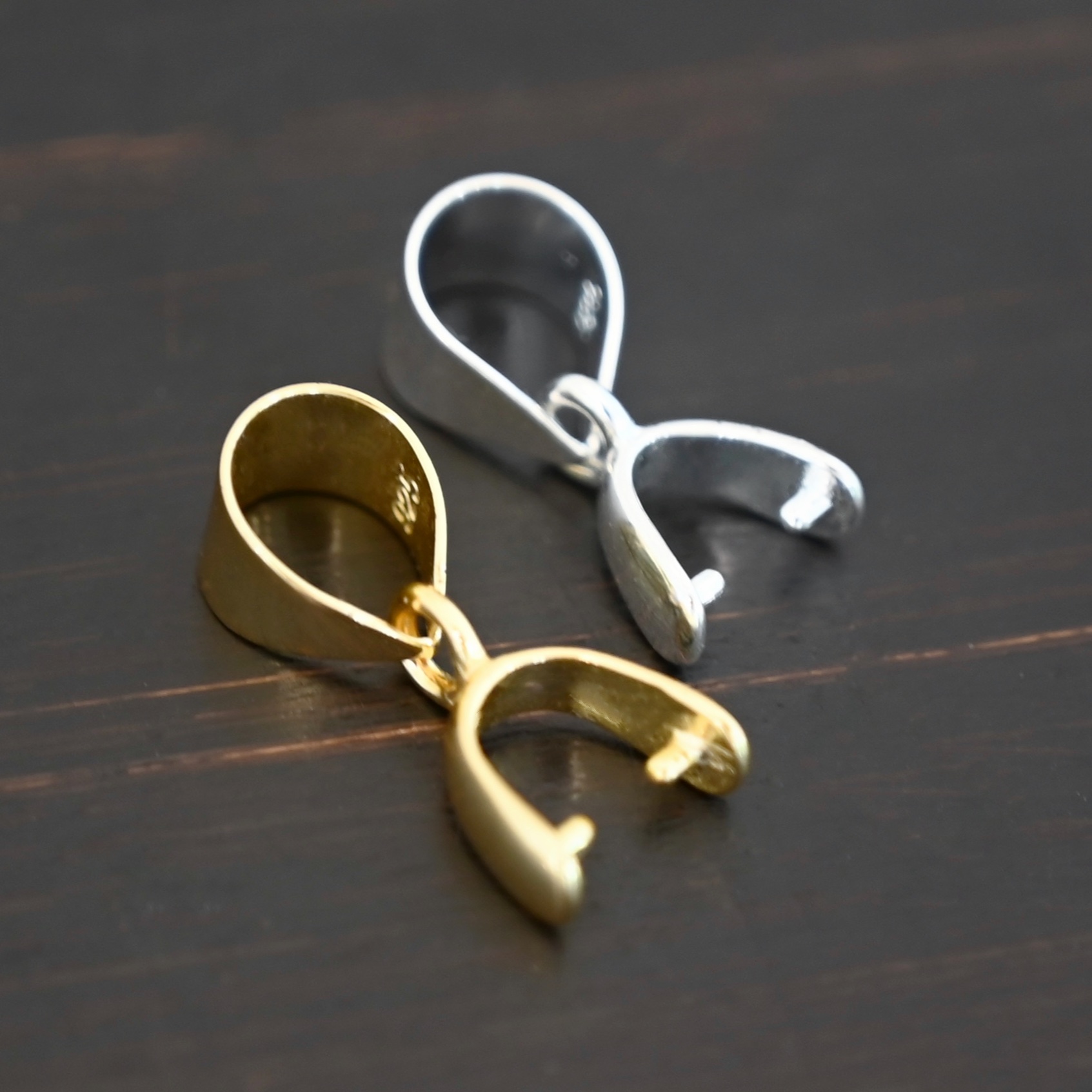 Silver & Gold Plated Pinch Bail - shown on dark background