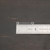 Stick Loop - oxidized shown by ruler