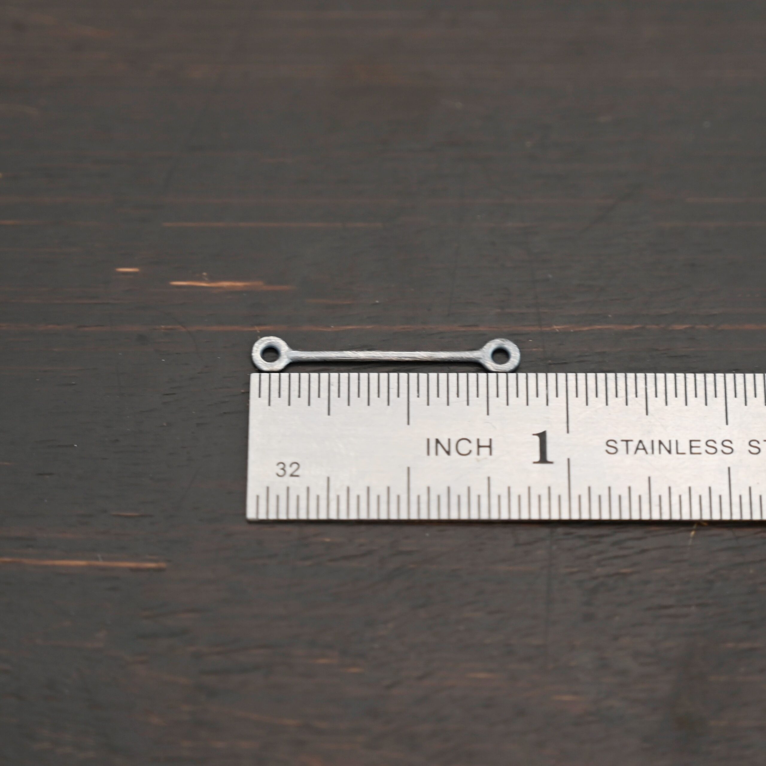 Stick Loop - oxidized Stick Loop - oxidized shown by ruler