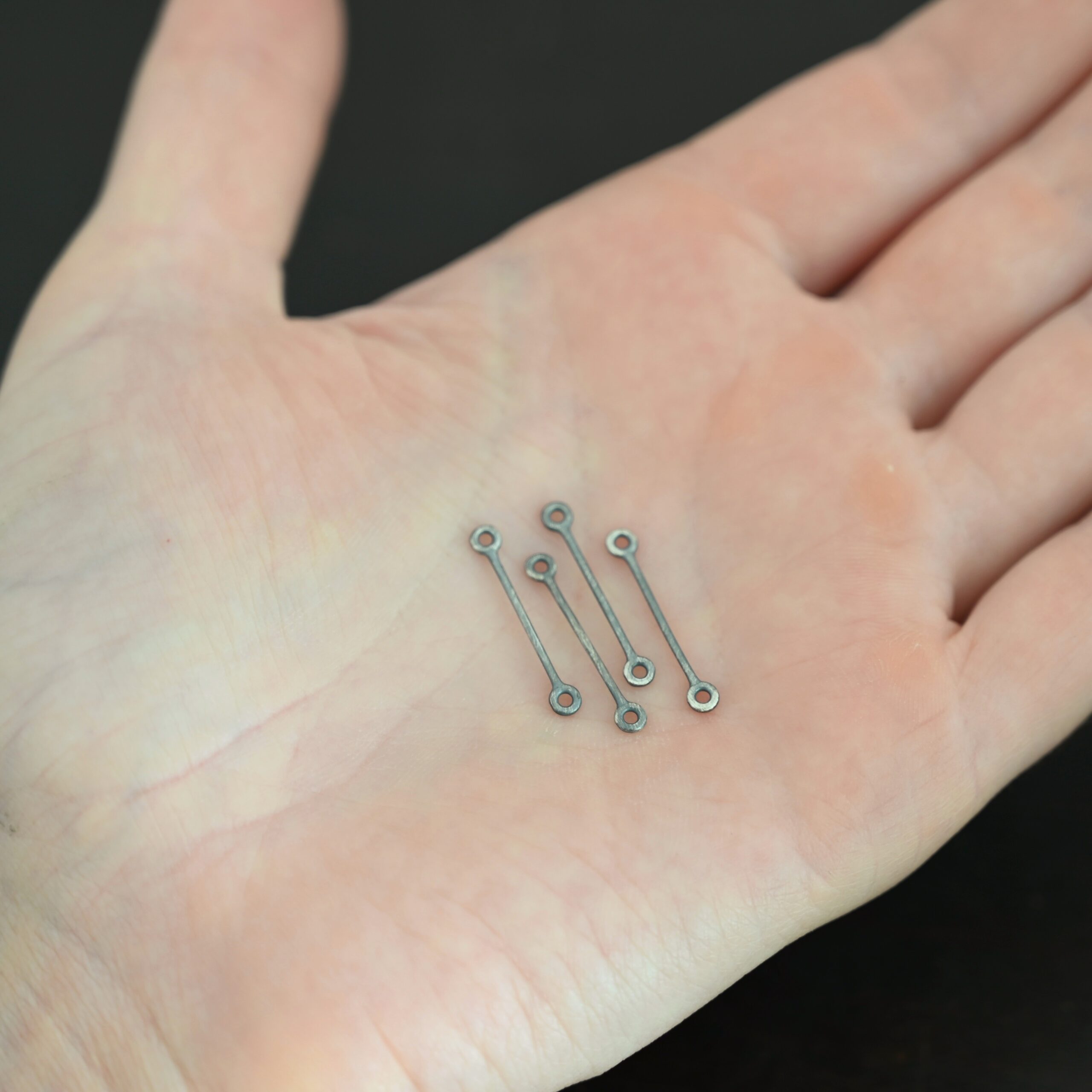 Stick Loop - oxidized Stick Loop - oxidized shown in hand