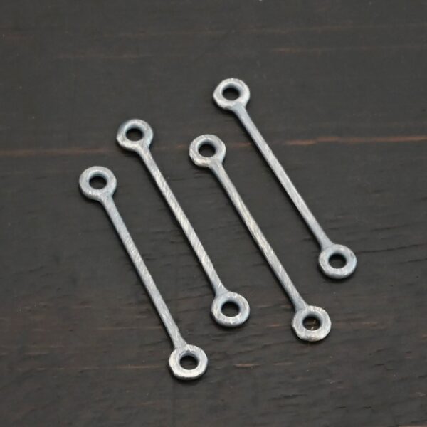 Stick Loop - oxidized shown on dark background