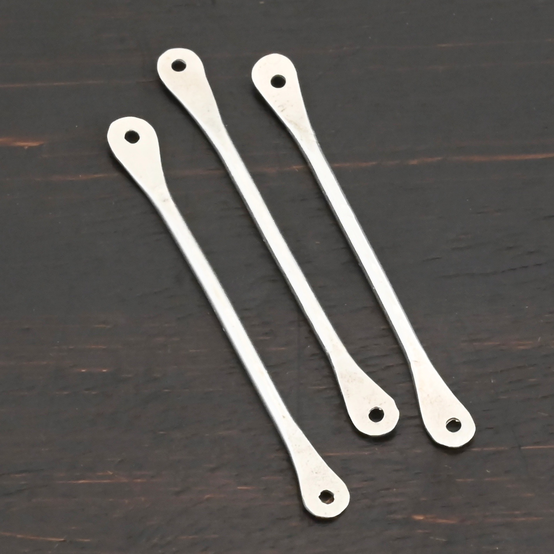 Hammered stick - shiny shown on dark background