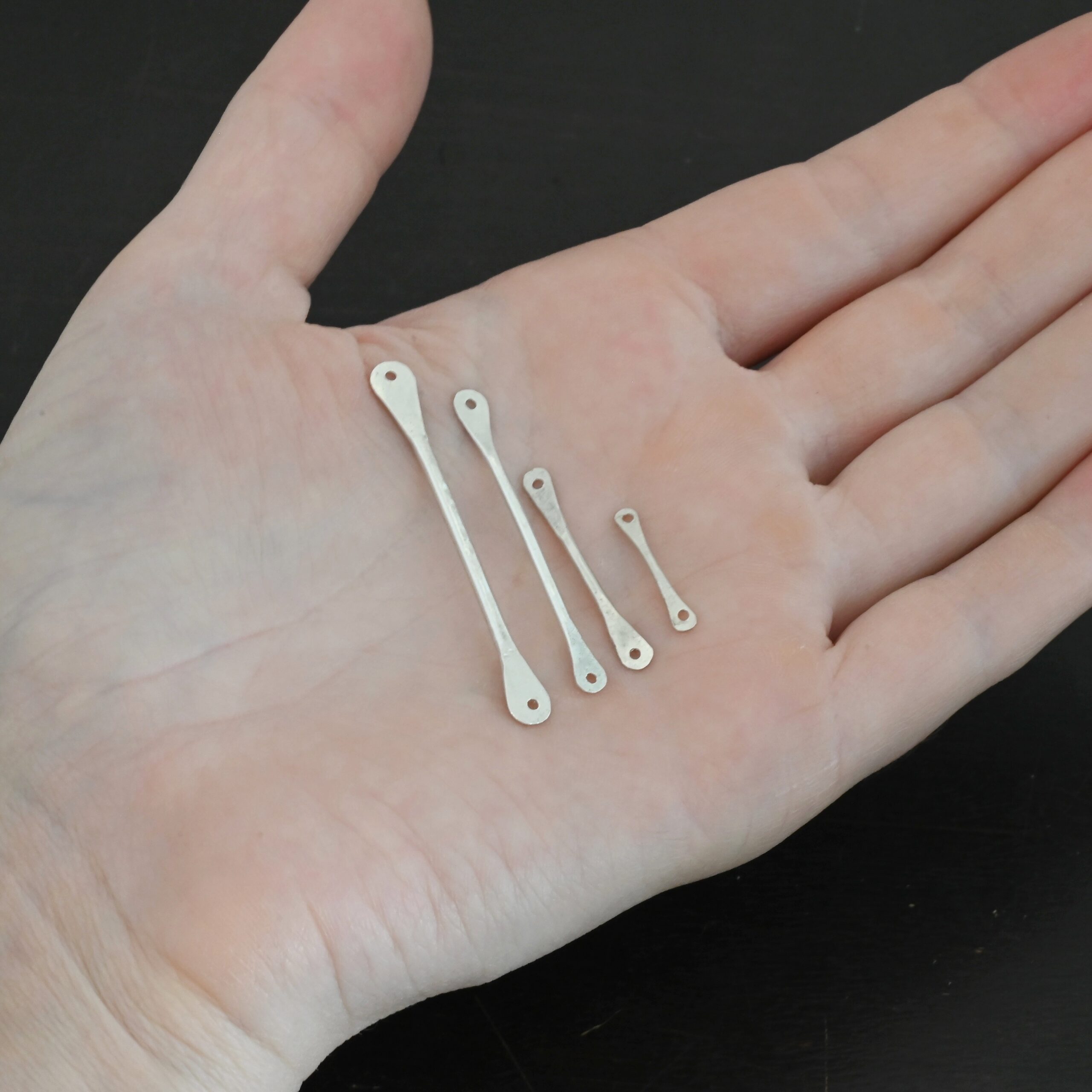 Hammered stick - shiny shown in hand