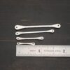 Hammered stick - shiny shown by ruler