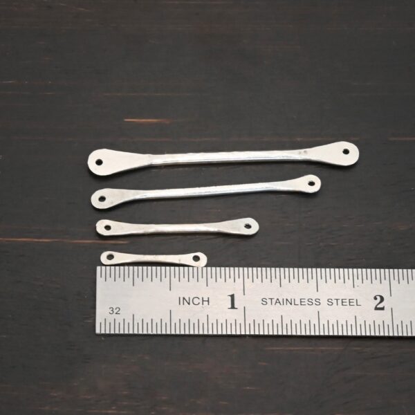 Hammered stick - shiny shown by ruler