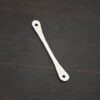 Hammered stick - shiny shown on dark background