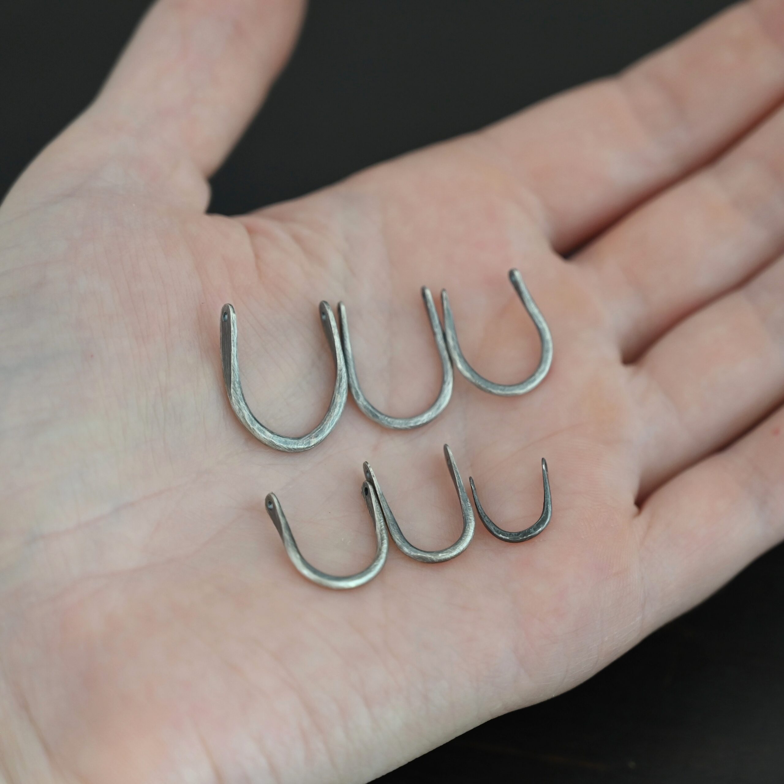 U Shaped finding - oxidized hammered shown in hand