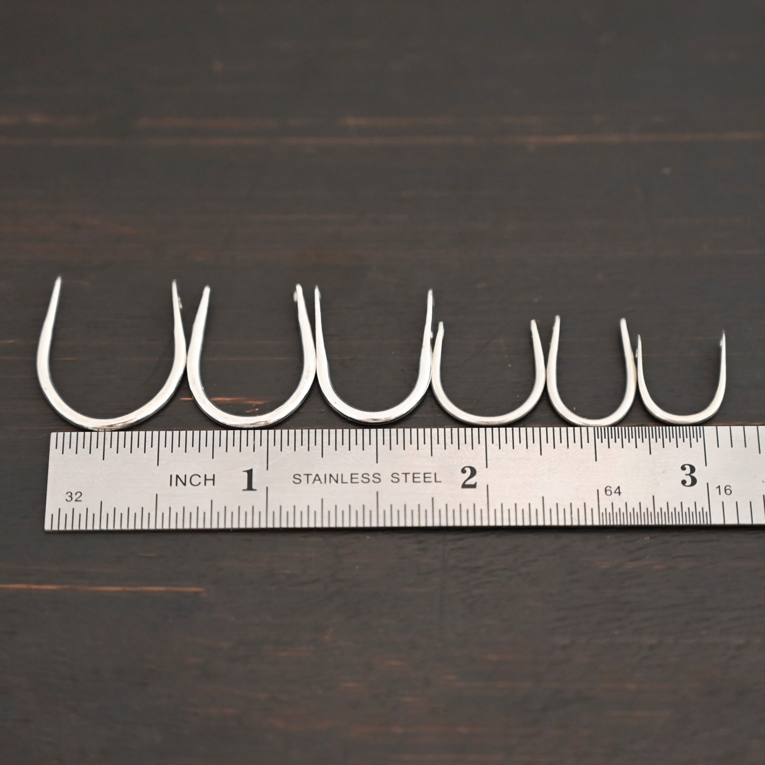 U Shaped finding - shiny smooth shown by ruler