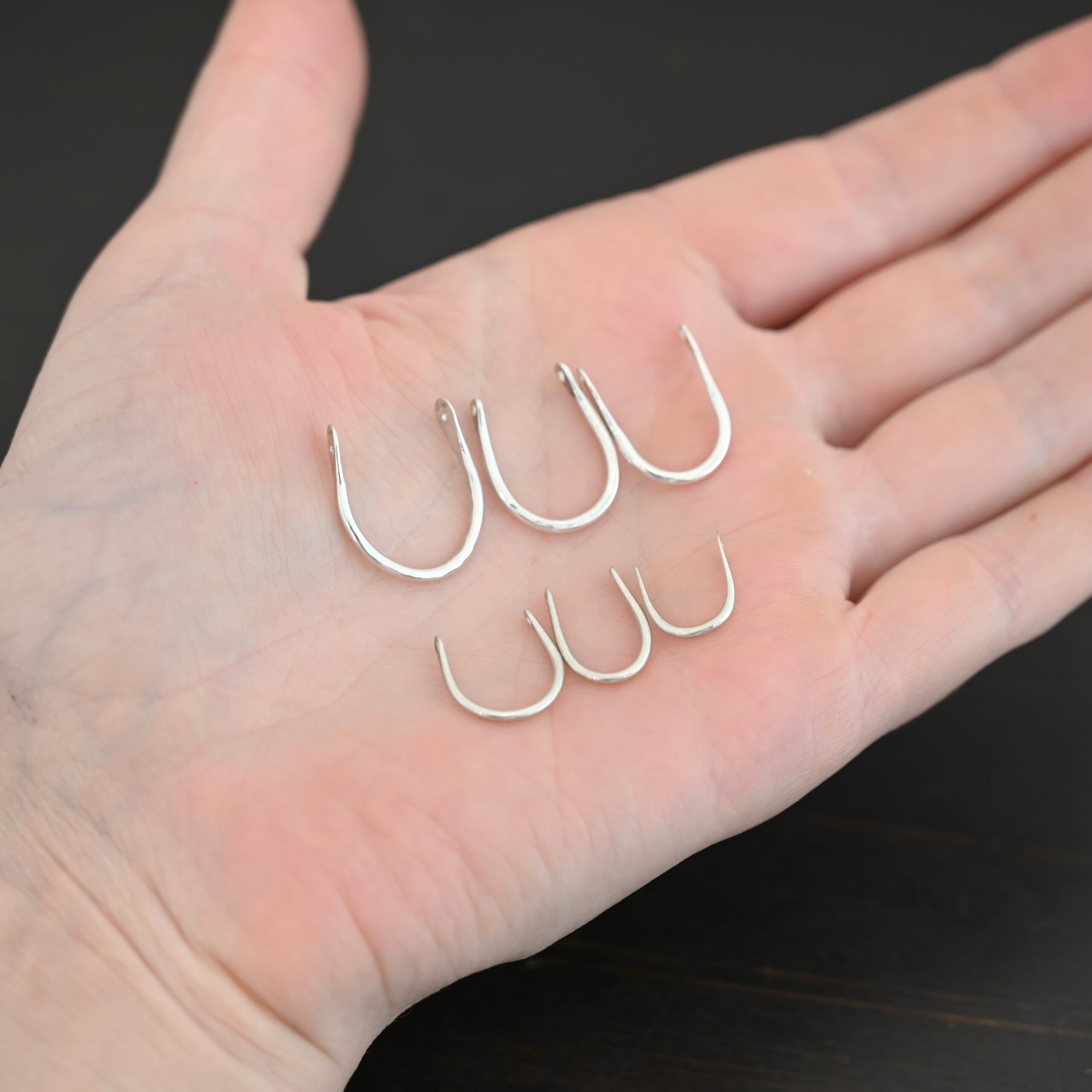 U Shaped finding - shiny smooth shown in hand