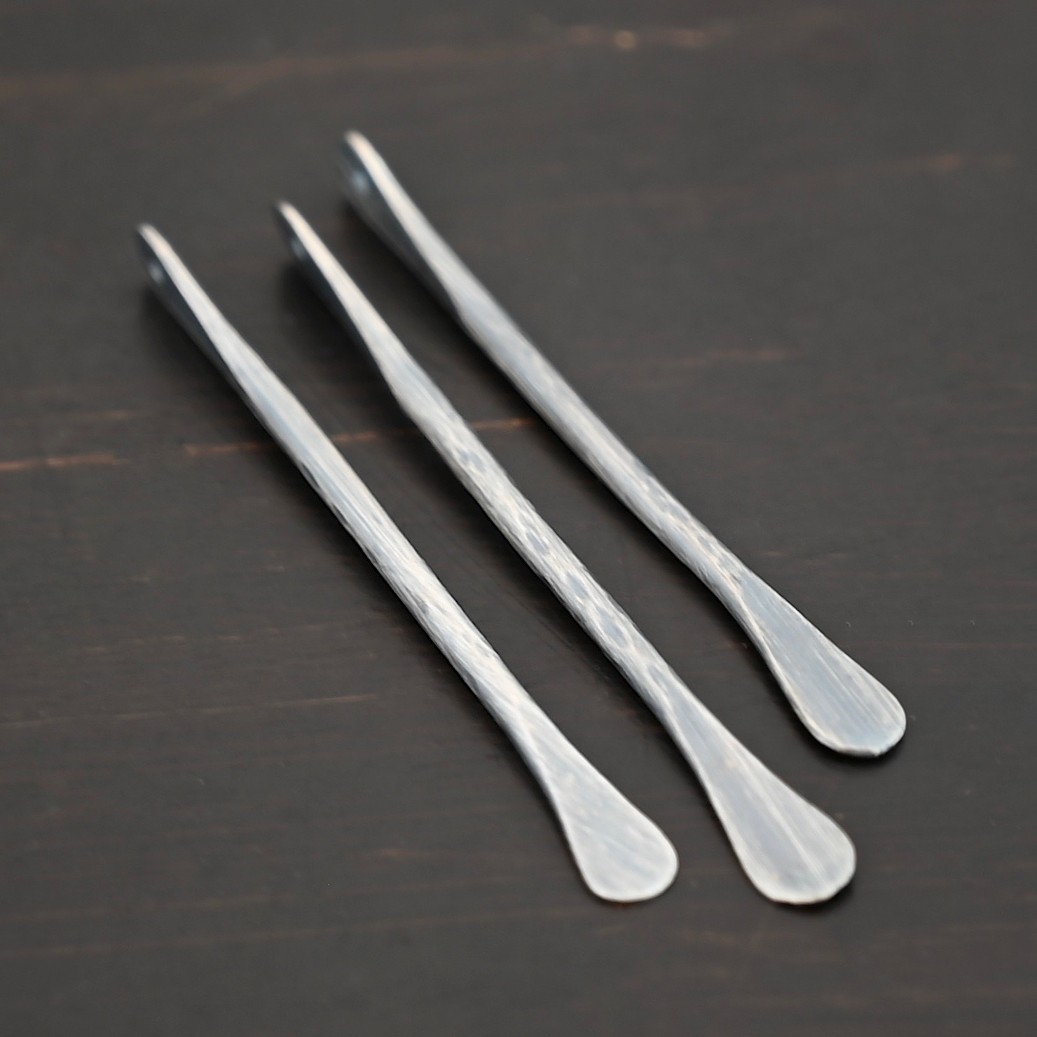 Hammered Paddle - Oxidized shown on dark background