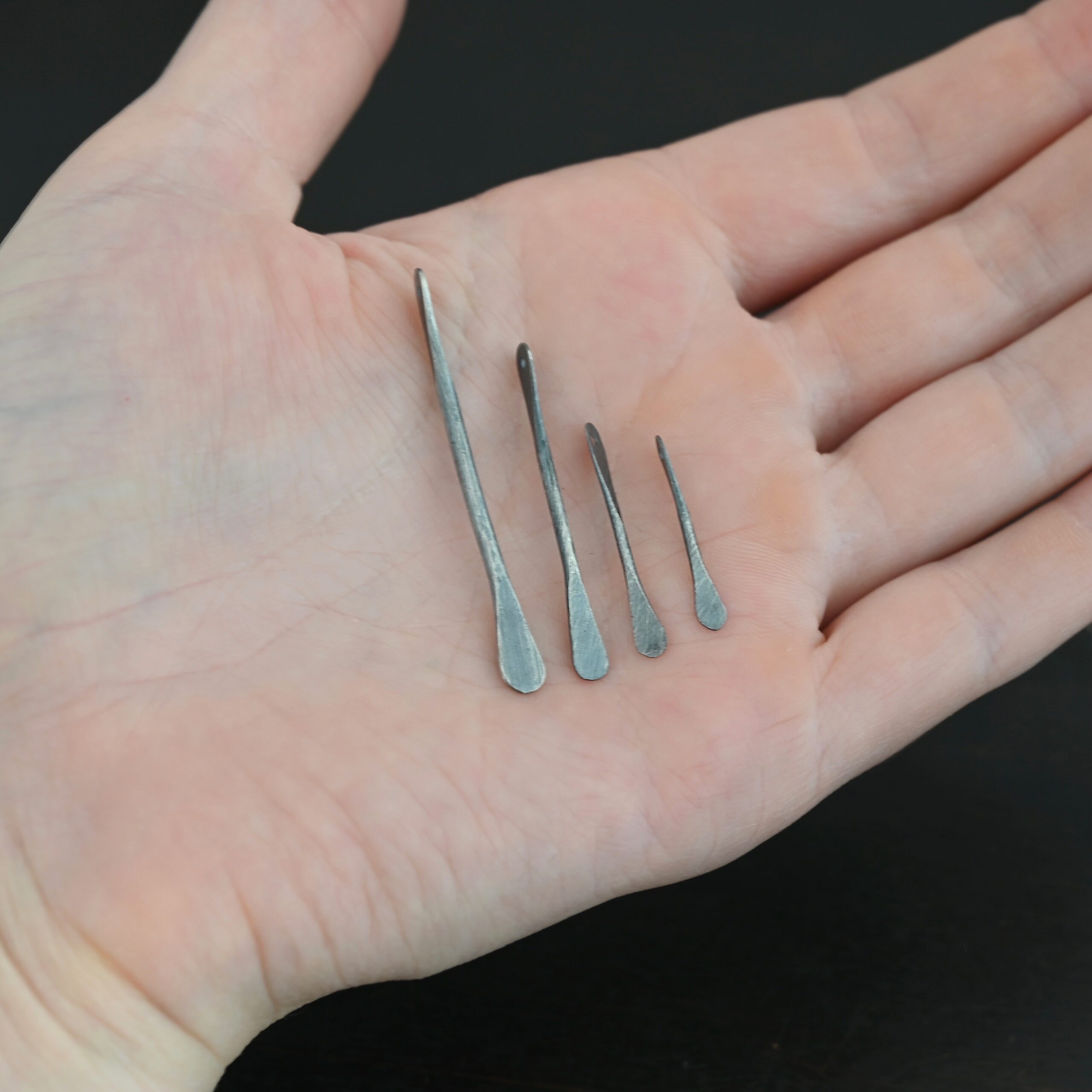 Hammered Paddle - Oxidized shown in hand