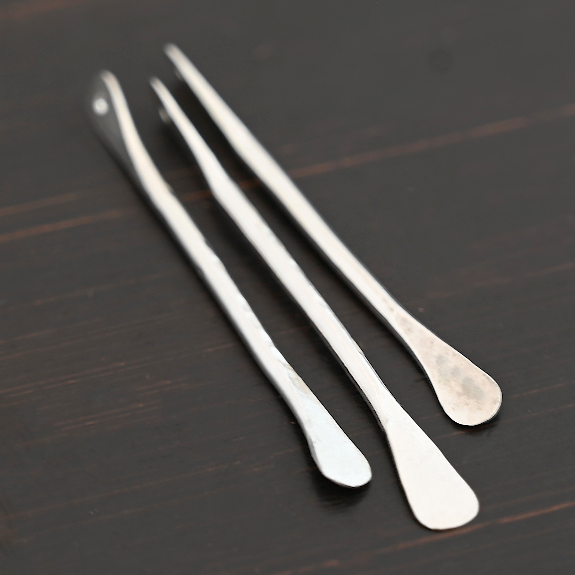 Hammered Paddle - shiny shown on dark background