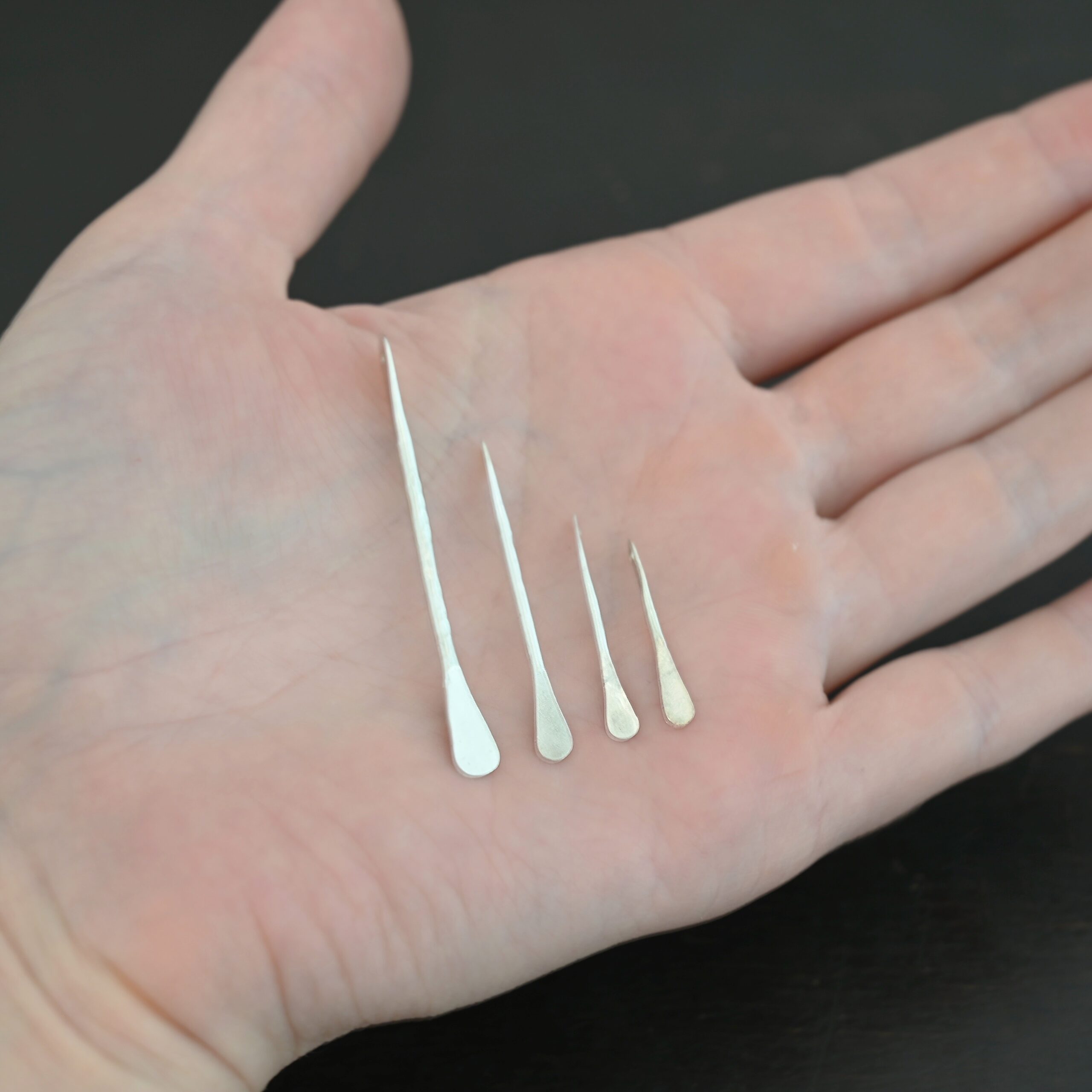 Hammered Paddle - shiny shown in hand