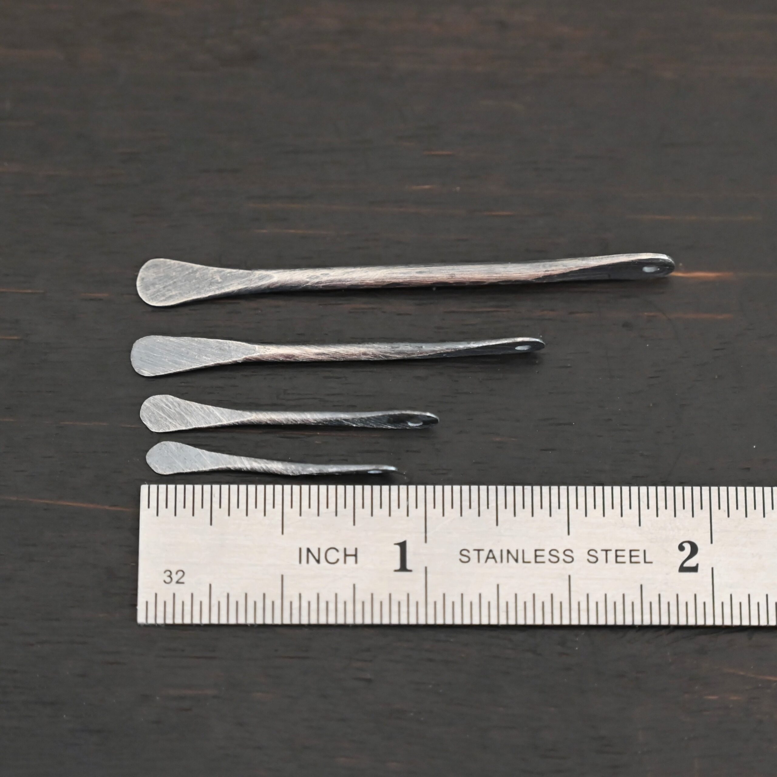 Hammered Paddle - oxidized shown by ruler