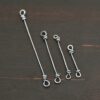 Stick Loop Finding - oxidized shown on dark background