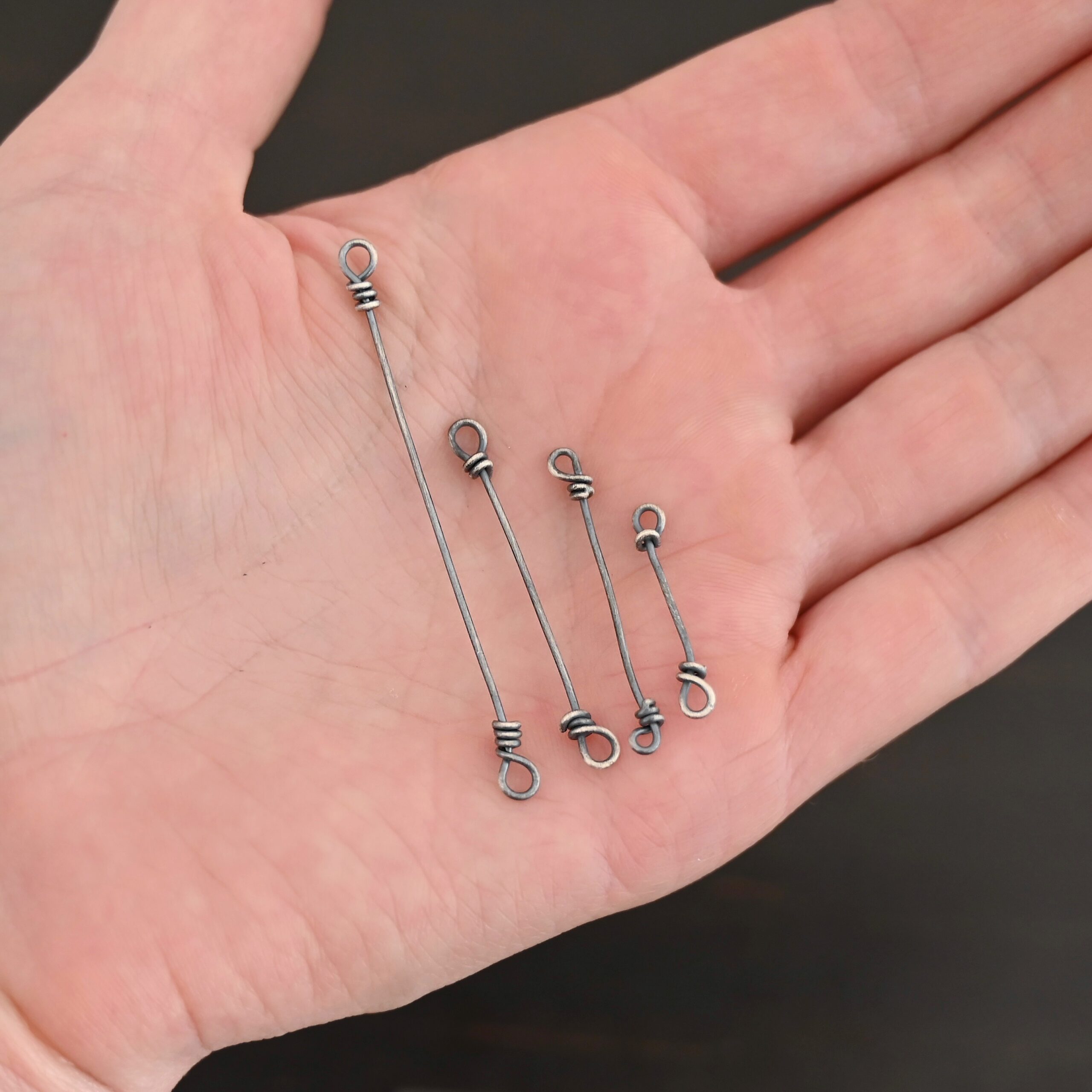 Stick Loop Finding -oxidized Stick Loop Finding -oxidized shown in hand