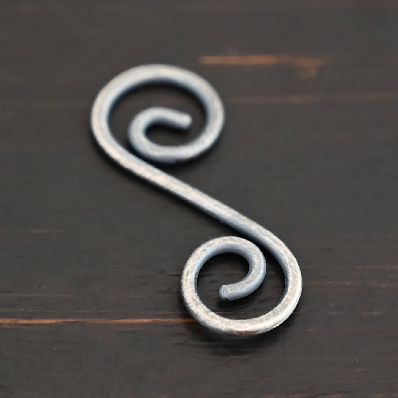 Hammered Swirl Finding - oxidized S Shaped Finding - oxidized shown on dark background