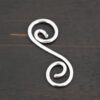 S Shaped Finding - shiny shown on dark background