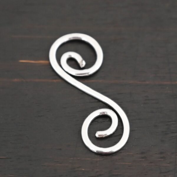 S Shaped Finding - shiny shown on dark background