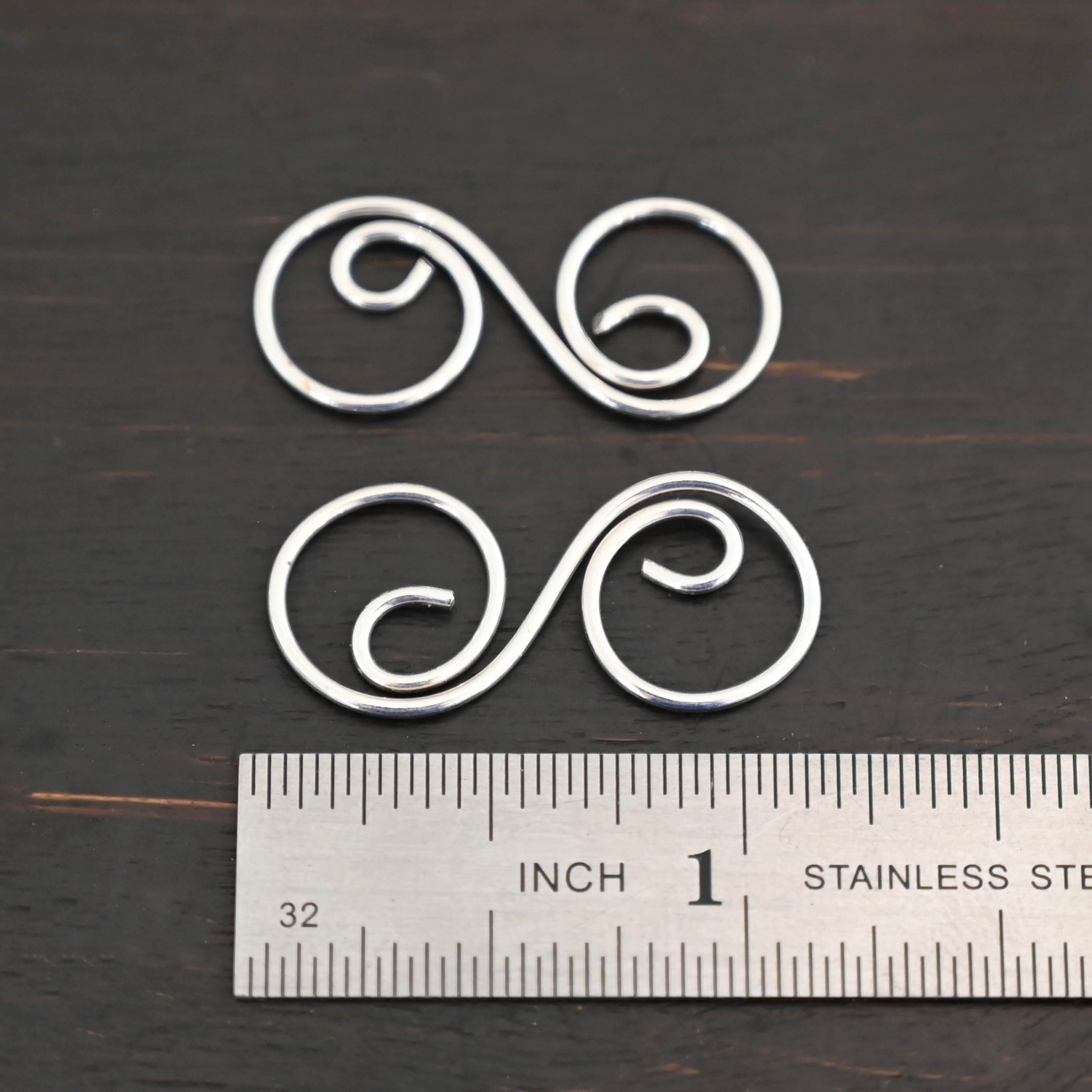 Paired S Shaped Finding - shiny smooth shown by ruler
