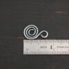 S Shaped Finding - oxidized smooth shown by ruler