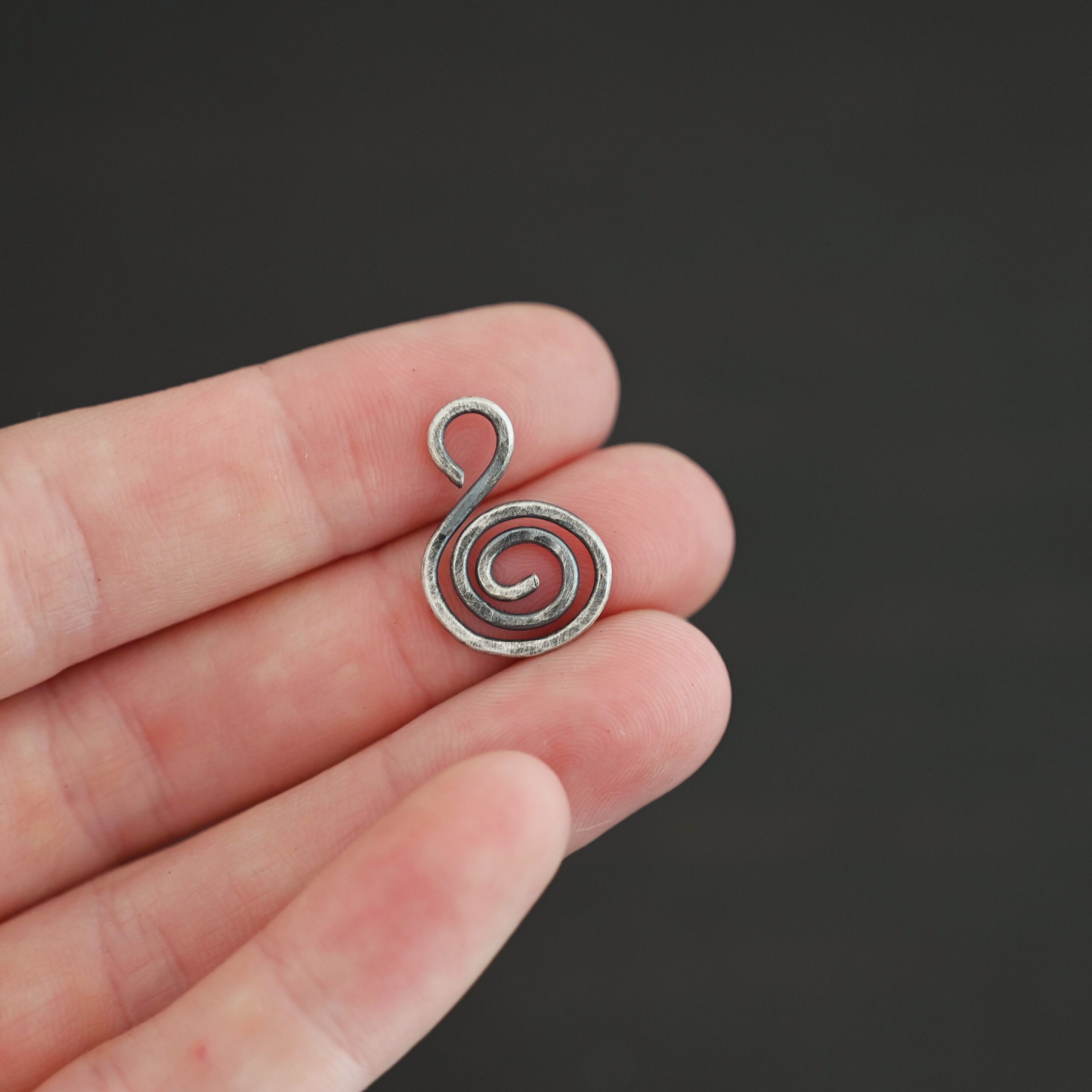 S Shaped Finding - oxidized hammered shown in hand