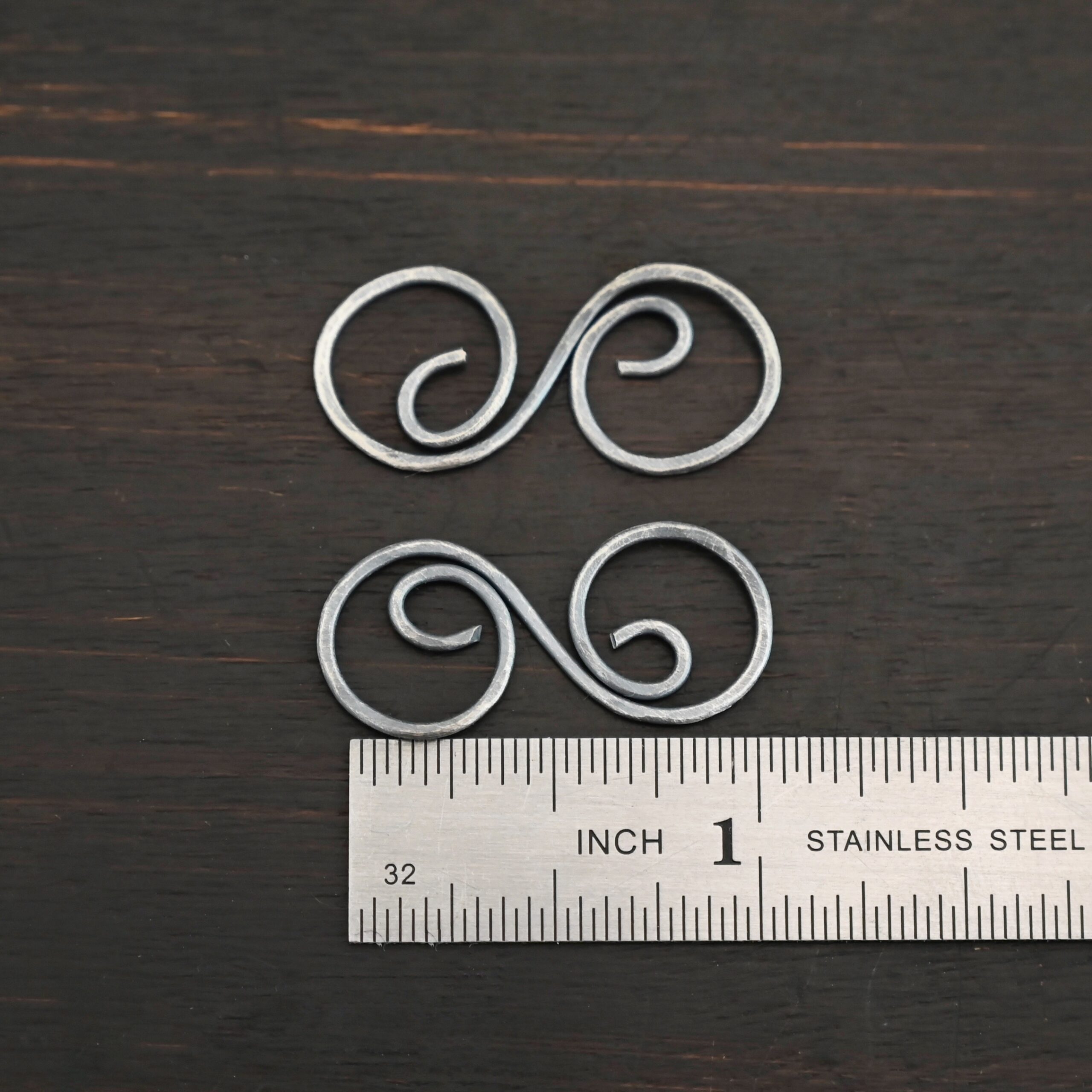 Paired S Shaped Finding - oxidized hammered shown by ruler