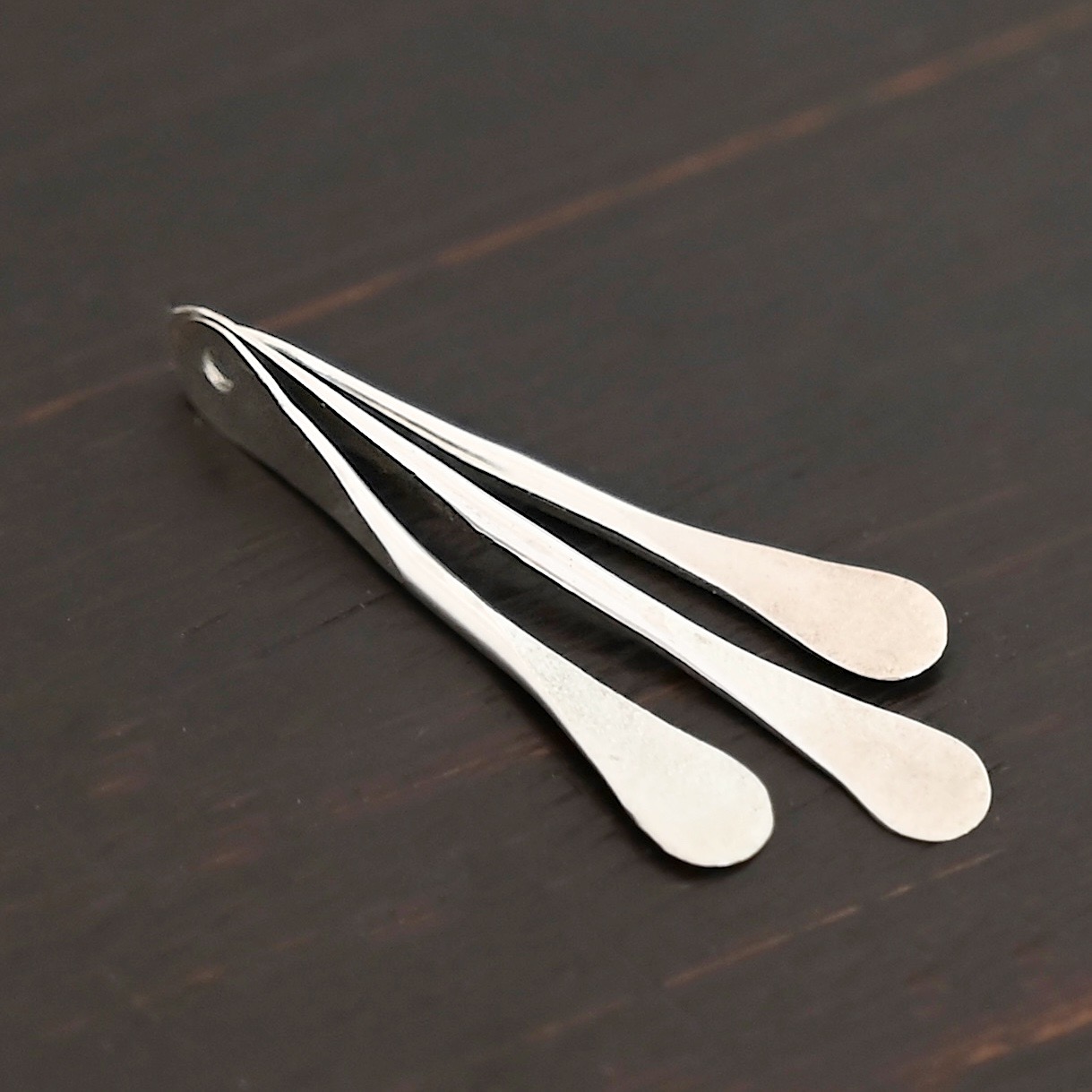 Necklace Component - shiny shown on dark background