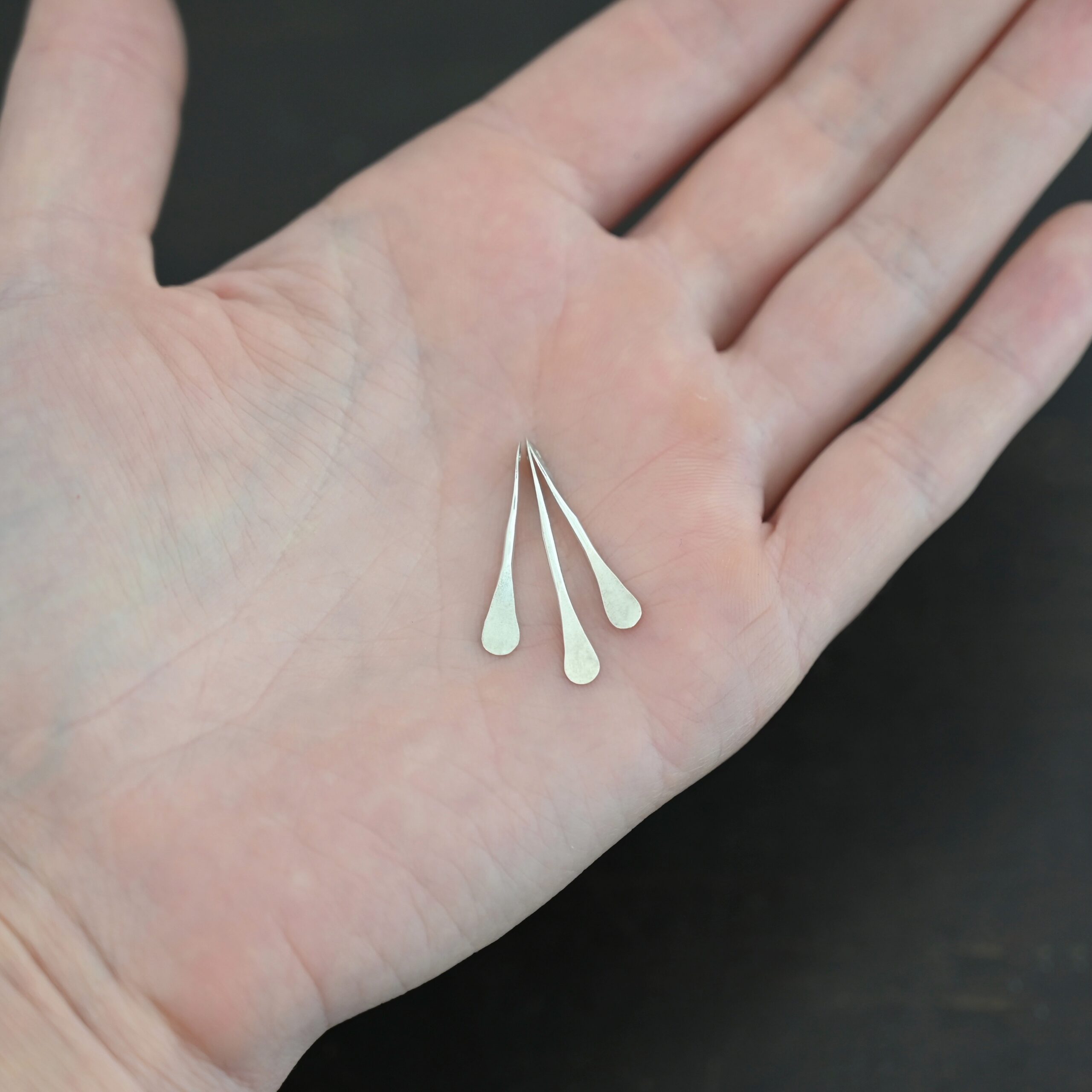 Necklace Component - shiny shown in hand