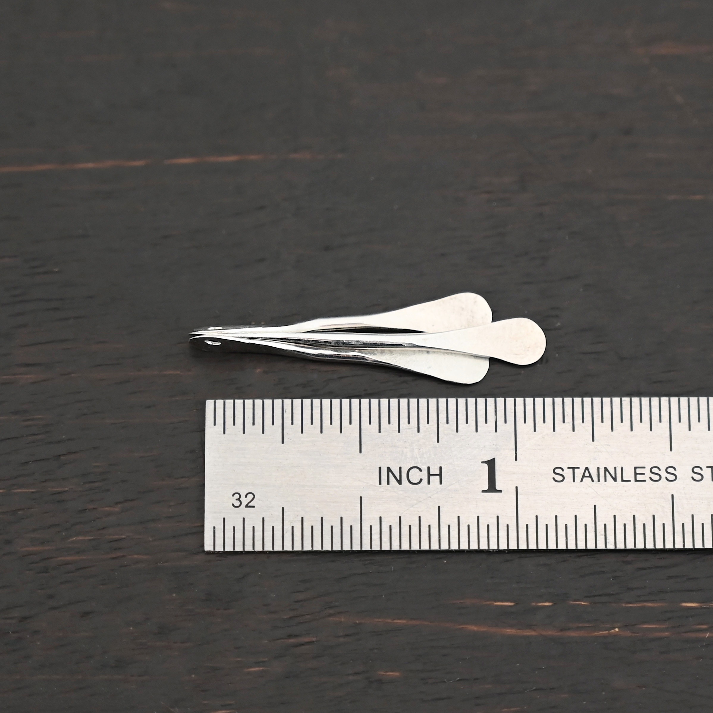 Necklace Component - shiny shown by ruler