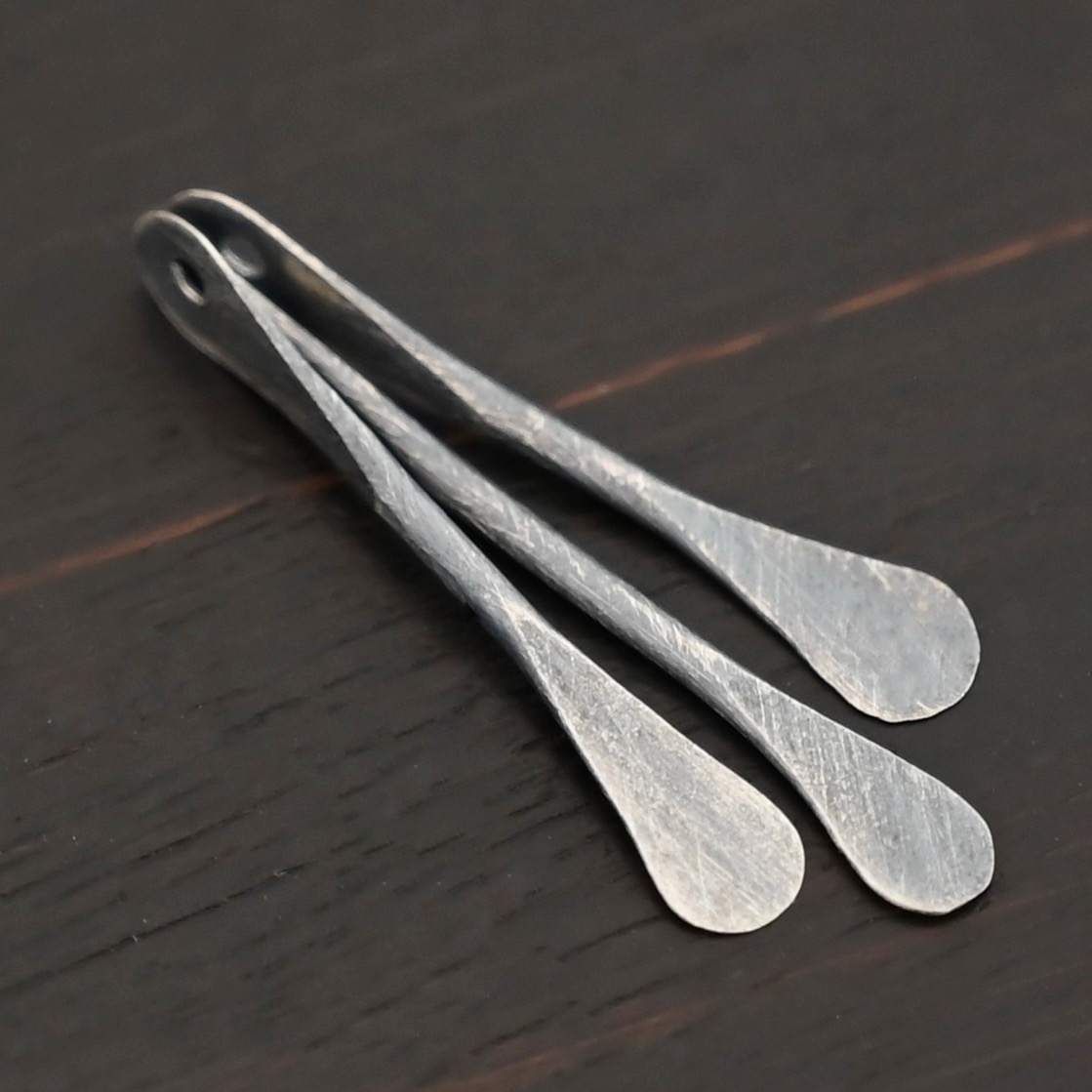 Necklace Component - oxidized shown on dark background