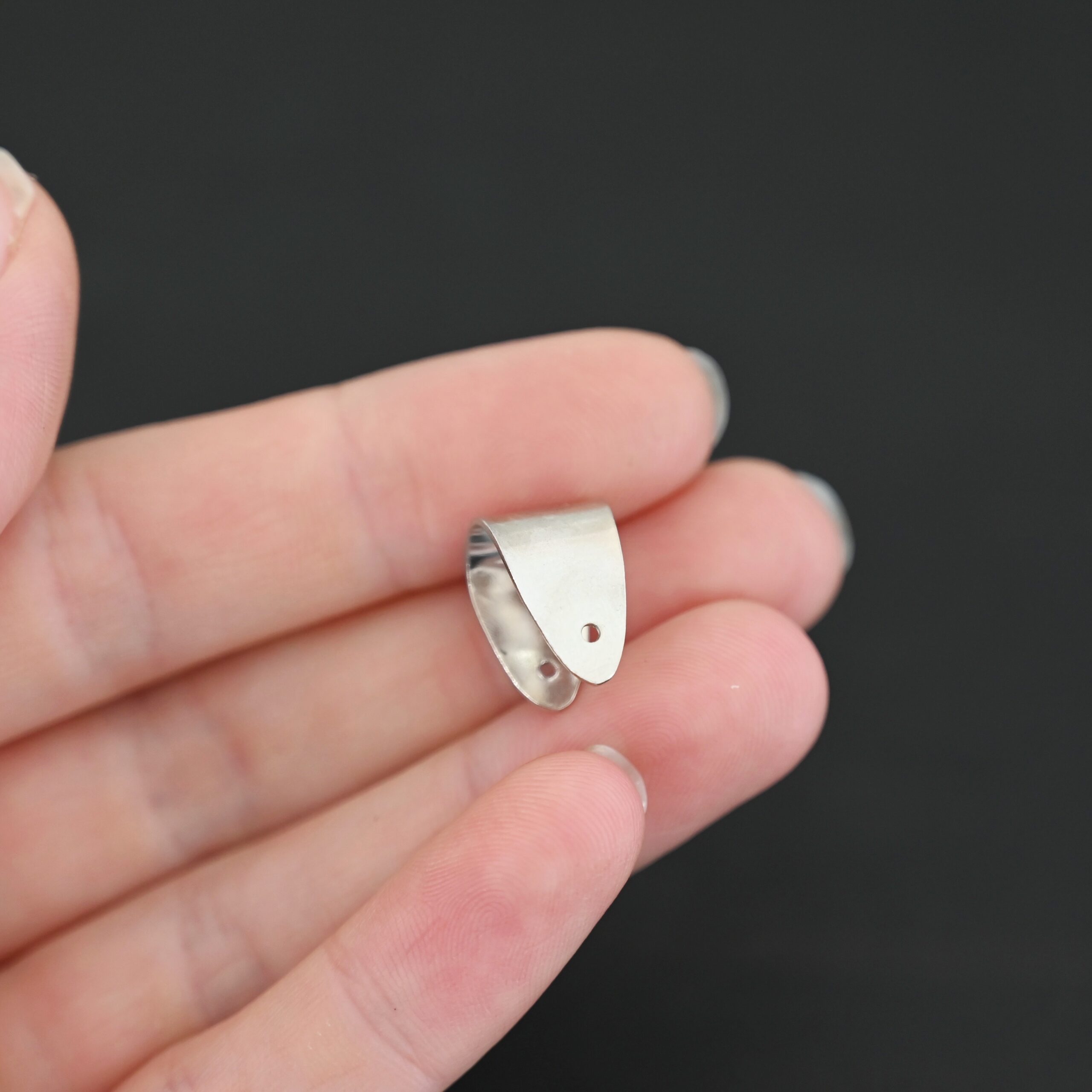 Handmade Pinch Bail - shiny plain shown in hand