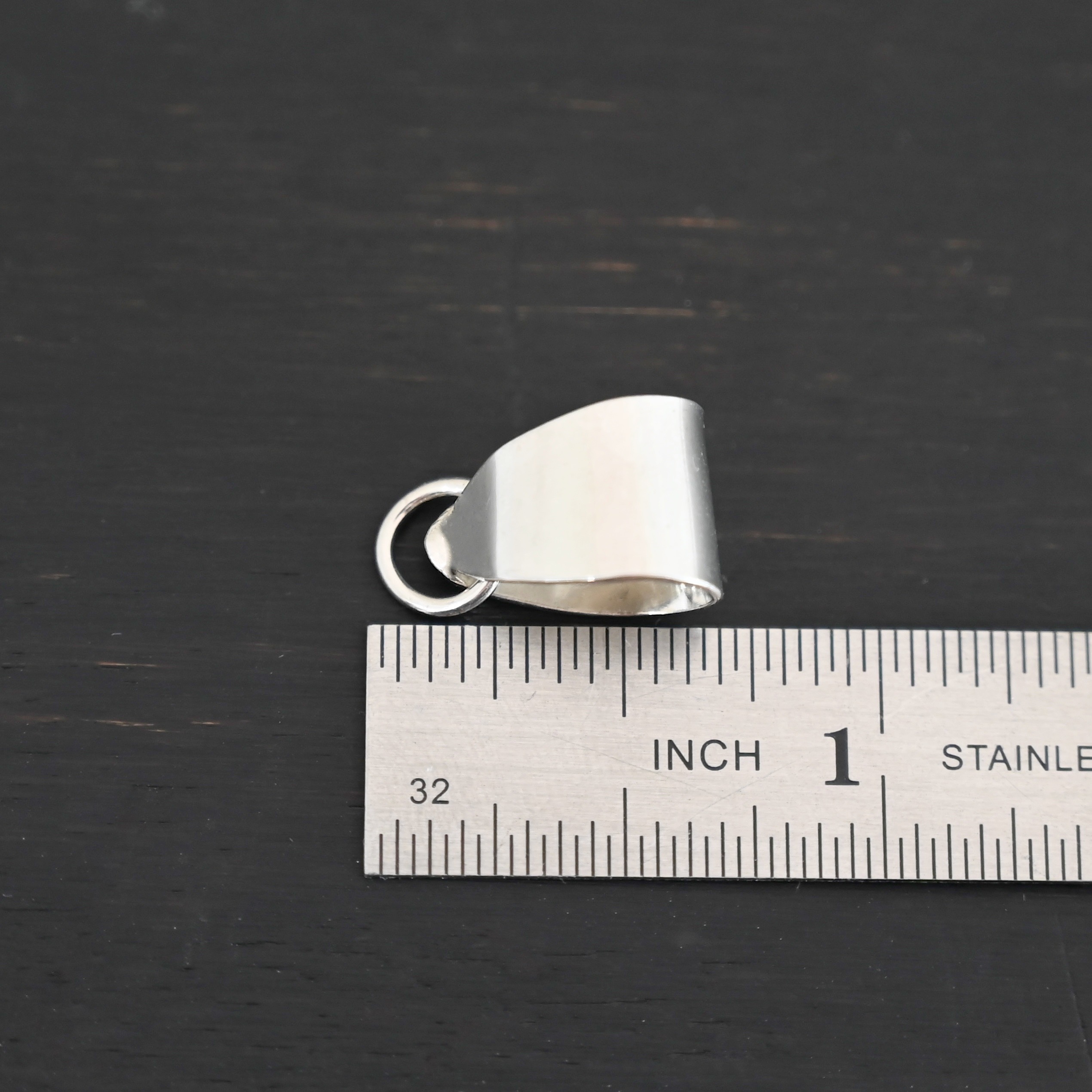Handmade Pinch Bail - shiny soldered jump ring shown by ruler