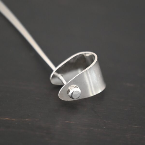 Handmade Pinch Bail - shiny headpin shown on dark background