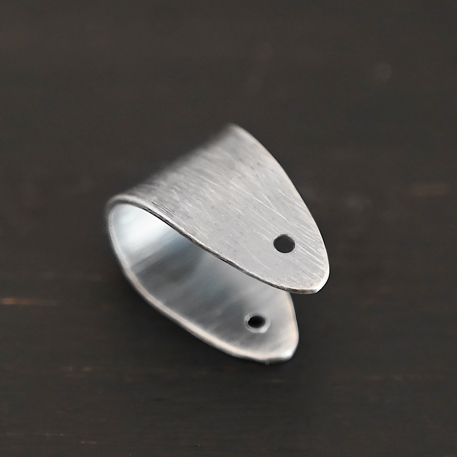 Handmade Pinch Bail - oxidized plain shown on dark background