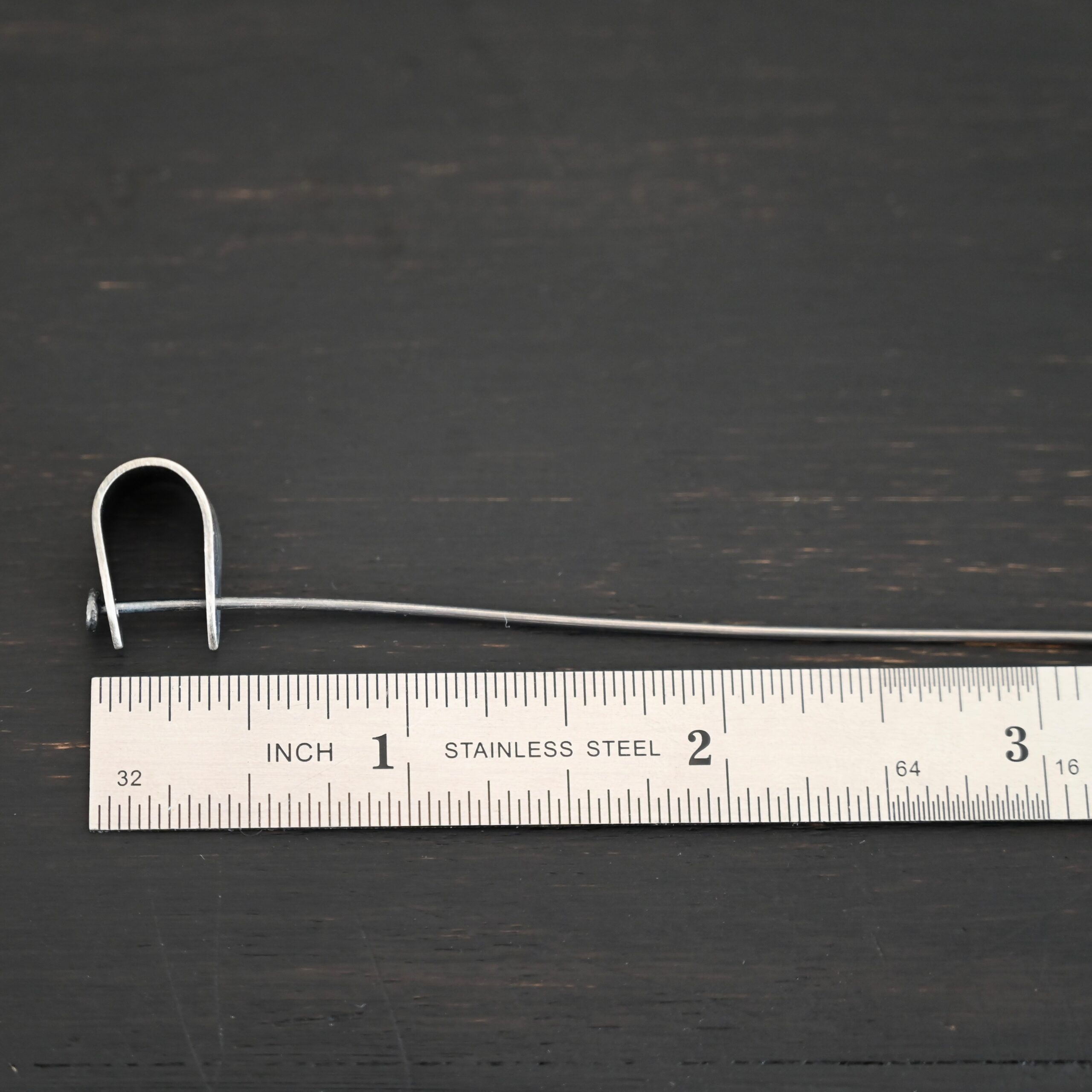 Handmade Pinch Bail - oxidized with headpin shown by ruler