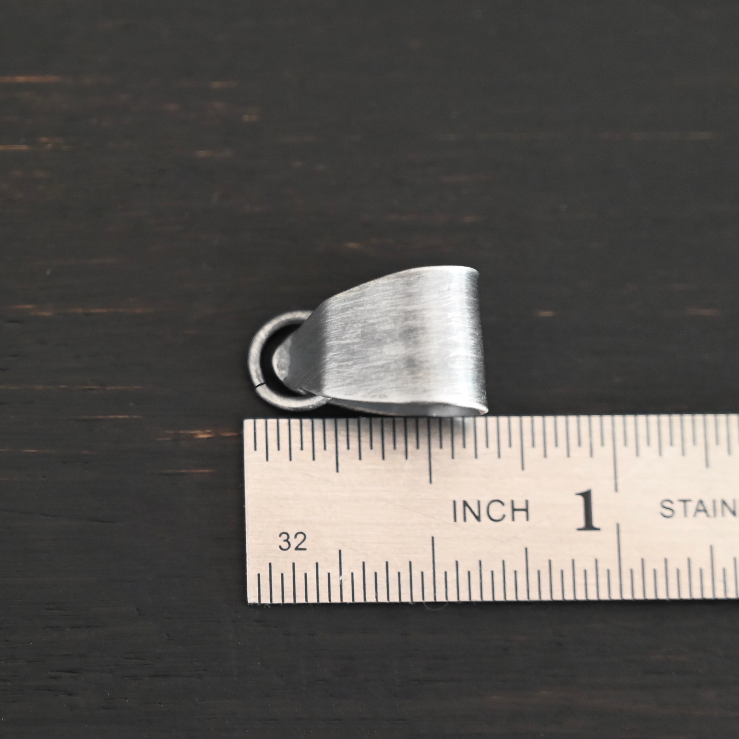 Handmade Pinch Bail - oxidized open jump ring shown by ruler