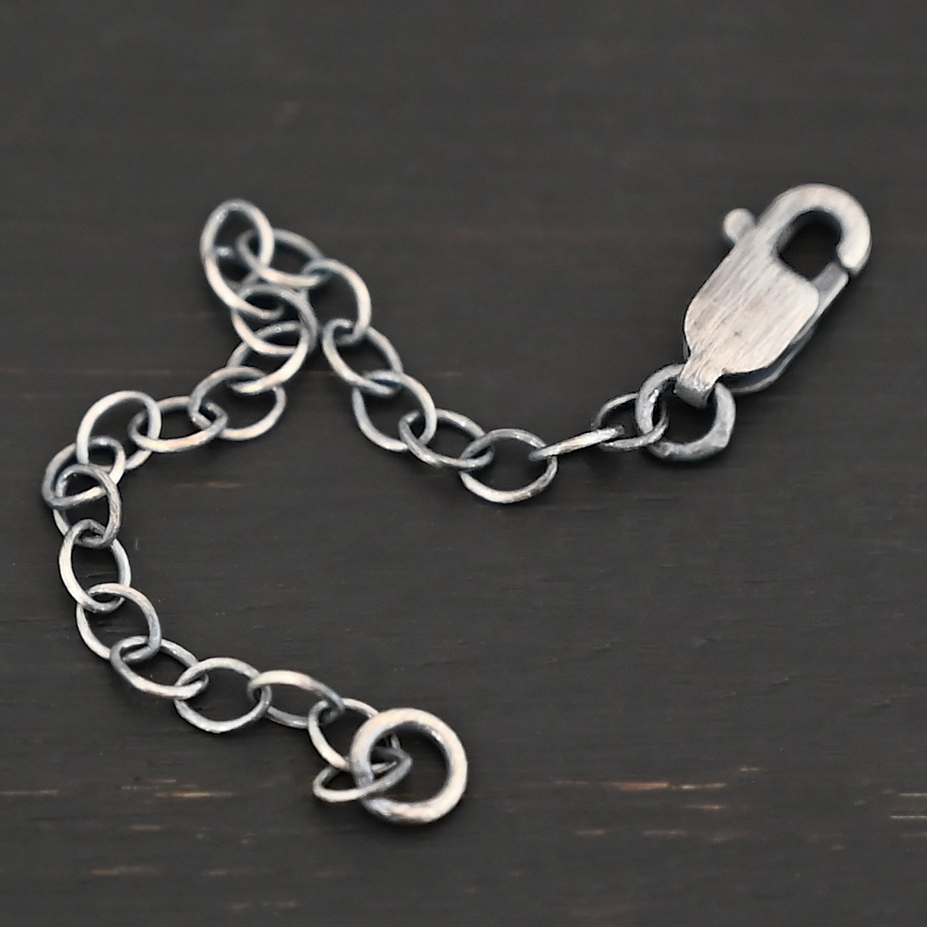 Everett Extension - oxidized small shown on dark background