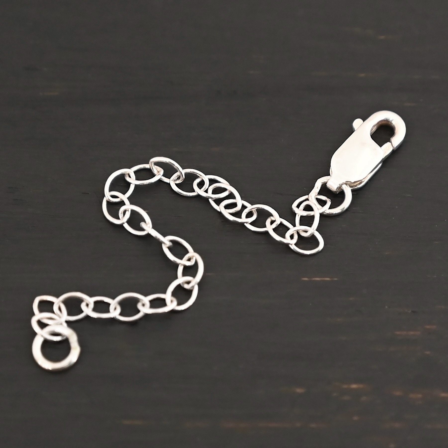 Everett Extension - shiny small shown on dark background