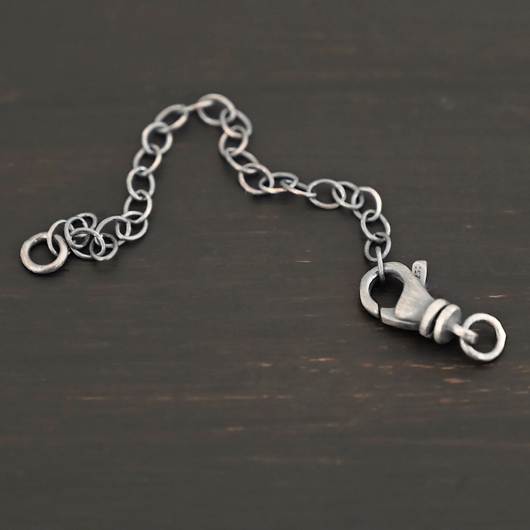 Eli Extension - oxidized shown on dark background