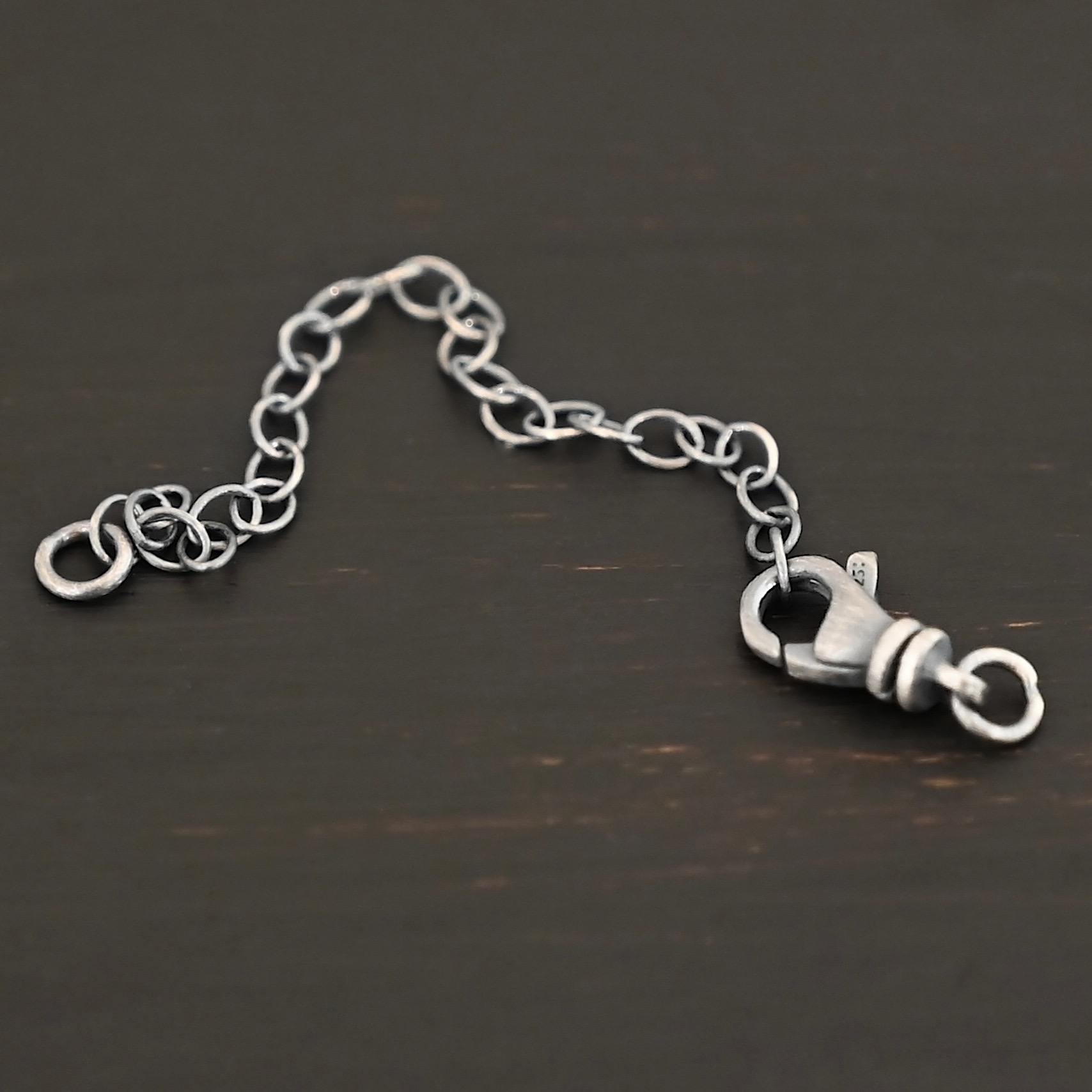 Eli Extension - oxidized shown on dark background