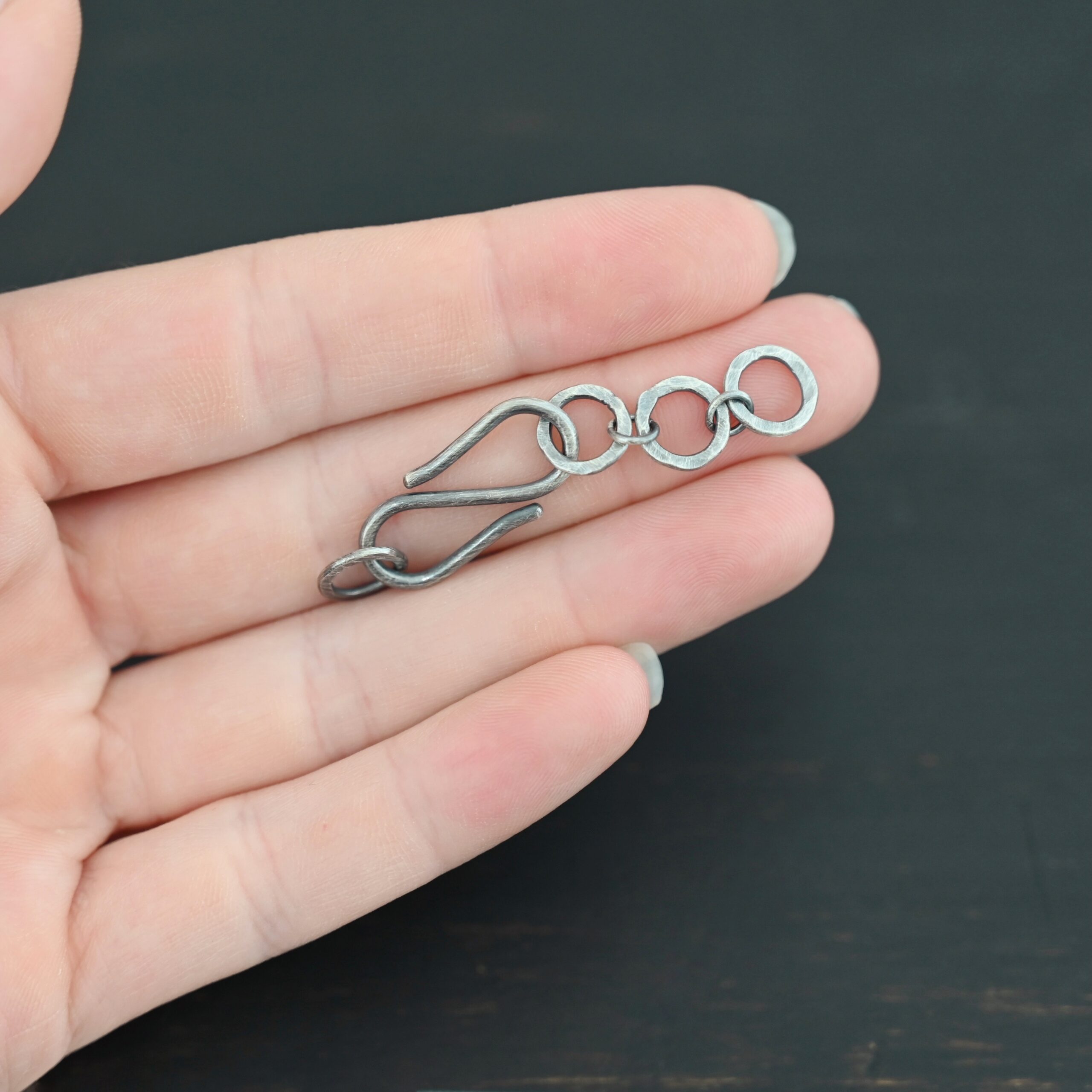 Ezra Extension - oxidized shown in hand