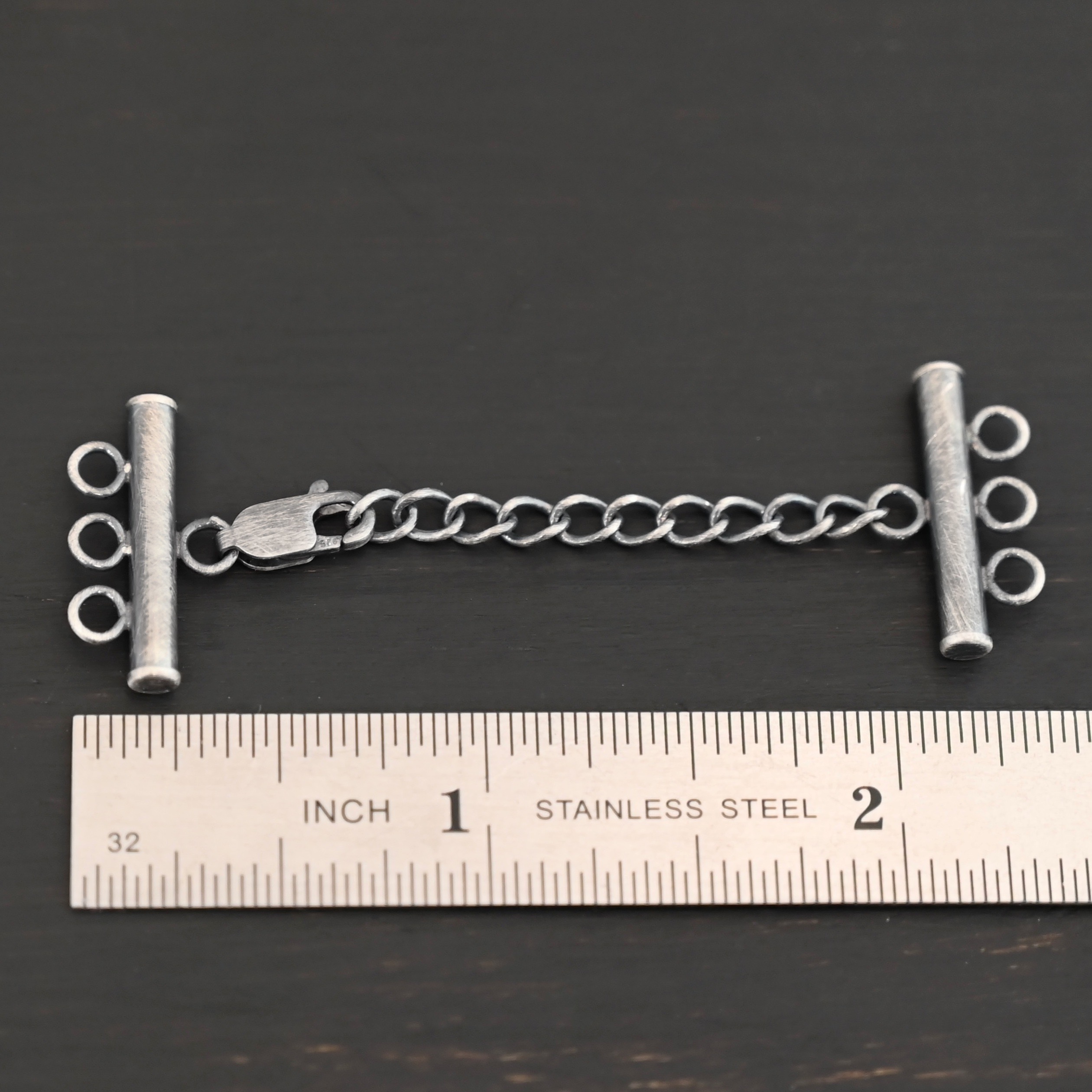 Maverick Extension - oxidized shown by ruler